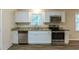 Kitchen with granite countertops and stainless steel appliances at 541 N Hairston Rd, Stone Mountain, GA 30083
