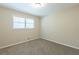 Bright bedroom with window and neutral color palette at 541 N Hairston Rd, Stone Mountain, GA 30083