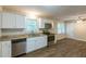 Eat-in kitchen with granite countertops and stainless steel appliances at 541 N Hairston Rd, Stone Mountain, GA 30083