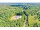 Aerial view of commercial building nestled in a wooded area at 787 Tidwell Rd, Powder Springs, GA 30127