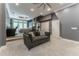 Main bedroom with sitting area, home gym and private balcony at 3915 Muirfield Sq, Duluth, GA 30096