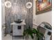 Elegant powder room with modern vanity and unique tile at 3915 Muirfield Sq, Duluth, GA 30096