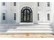 Close up of the front entrance with double doors and marble steps at 3915 Muirfield Sq, Duluth, GA 30096