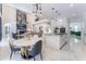 Kitchen with breakfast nook and view into living room at 3915 Muirfield Sq, Duluth, GA 30096