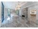 Spacious main bedroom with large windows, marble floors, and a fireplace at 3915 Muirfield Sq, Duluth, GA 30096