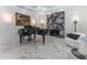 Music room with marble fireplace, grand piano, and modern chandelier at 3915 Muirfield Sq, Duluth, GA 30096