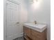 Modern bathroom with a floating vanity and quartz countertop at 3915 Muirfield Sq, Duluth, GA 30096