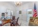 Bright home office with marble floors and an elegant desk at 3915 Muirfield Sq, Duluth, GA 30096