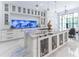 Open concept kitchen with large island and built-in aquarium at 3915 Muirfield Sq, Duluth, GA 30096