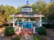 Gazebo with brick patio overlooking tennis courts at 3915 Muirfield Sq, Duluth, GA 30096