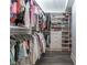 Large walk-in closet with ample shelving and hanging space at 3915 Muirfield Sq, Duluth, GA 30096