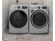 Laundry room with matching washer and dryer set at 3915 Muirfield Sq, Duluth, GA 30096