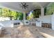 Outdoor kitchen features stone countertops and stainless steel appliances at 3915 Muirfield Sq, Duluth, GA 30096