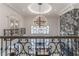 Open landing overlooking living room and foyer at 3915 Muirfield Sq, Duluth, GA 30096