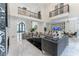 Spacious living room with high ceilings and marble floors at 3915 Muirfield Sq, Duluth, GA 30096