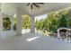 Spacious balcony with wrought iron railings overlooking a wooded area at 3915 Muirfield Sq, Duluth, GA 30096