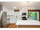 Updated kitchen featuring stainless steel appliances and a breakfast bar at 3900 Hilton Cts, Decatur, GA 30035