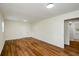 Large bonus room with wood-look floors and access to another room at 3900 Hilton Cts, Decatur, GA 30035