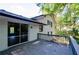 Deck off of the back of the house with a view of the wooded backyard at 3900 Hilton Cts, Decatur, GA 30035