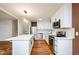 Modern kitchen with white cabinets, stainless steel appliances, and quartz countertops at 3900 Hilton Cts, Decatur, GA 30035