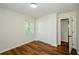 Well-lit bedroom with closet and access to another room at 3900 Hilton Cts, Decatur, GA 30035