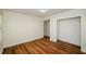 Well-lit bedroom with wood-look floors and a large closet at 3900 Hilton Cts, Decatur, GA 30035