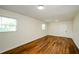 Spacious bonus room with wood-look floors and multiple windows at 3900 Hilton Cts, Decatur, GA 30035