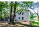 Back of house with white brick exterior and deck at 3900 Hilton Cts, Decatur, GA 30035