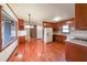 Kitchen with wood cabinets, hardwood floors, and stainless steel appliances at 1337 Arden Sw Dr, Marietta, GA 30008