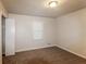 Spacious bedroom with neutral walls, carpeted floors and a closet at 4111 Wrexham Dr, Snellville, GA 30039