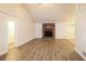 Spacious living room with brick fireplace and laminate flooring at 4111 Wrexham Dr, Snellville, GA 30039