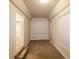 Small office with carpet and window coverings at 4111 Wrexham Dr, Snellville, GA 30039