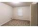 Simple bedroom with neutral walls and carpeted floors at 4111 Wrexham Dr, Snellville, GA 30039