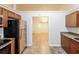 Kitchen with granite countertops and wood cabinets at 4111 Wrexham Dr, Snellville, GA 30039