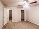 Bedroom with carpet, ceiling fan and access to another room at 4111 Wrexham Dr, Snellville, GA 30039