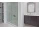 Modern bathroom with floating vanity and glass shower at 391 Pratt Se Dr # 704, Atlanta, GA 30315