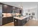 Modern kitchen with island, stainless steel appliances, and ample counter space at 391 Pratt Se Dr # 704, Atlanta, GA 30315