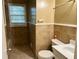 Bathroom with beige tile and a white vanity at 207 Howell Dr, Atlanta, GA 30331