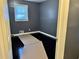 Bedroom with dark hardwood floors and gray walls at 207 Howell Dr, Atlanta, GA 30331