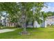 Gray house exterior with landscaping and driveway at 308 Goldenrod Dr, Stockbridge, GA 30281