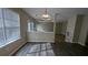 Kitchen dining area with hardwood floors and a view to the backyard at 1231 Sweetgum Trl, Conyers, GA 30012