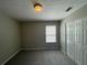 Spacious bedroom with neutral walls and wall-to-wall carpet at 3996 Kenner Sw Dr, Atlanta, GA 30331