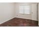 Bright bedroom with dark hardwood floors and neutral walls at 4110 Summer Wood Dr, Snellville, GA 30039