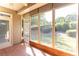 Sunroom with brick flooring and view of backyard at 3325 Olivia Ct, Cumming, GA 30041