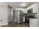 Modern kitchen with stainless steel appliances and granite countertops at 2362 Manor Ave, Atlanta, GA 30344