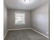 Simple bedroom with neutral walls and carpeted floors at 2362 Manor Ave, Atlanta, GA 30344