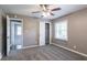 Spacious bedroom with carpet, ceiling fan and access to another room at 2362 Manor Ave, Atlanta, GA 30344
