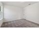 Spacious bedroom featuring grey carpet and neutral walls at 7276 Eton Ln, Locust Grove, GA 30248