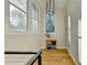 Bright landing area with hardwood floors and natural light at 5255 Buice Rd, Alpharetta, GA 30022
