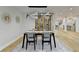 Elegant dining room features hardwood floors and a wine cellar at 5255 Buice Rd, Alpharetta, GA 30022